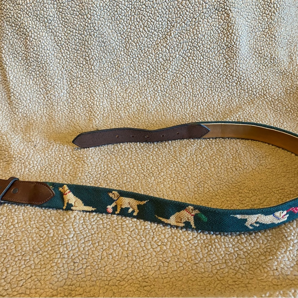 Needlepoint and Leather belt with playful dogs on it